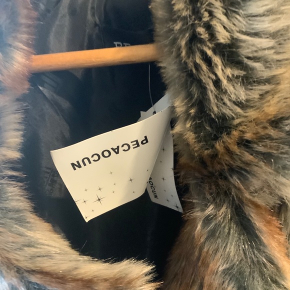 FAUX fur coat. Never worn. - Picture 2 of 2